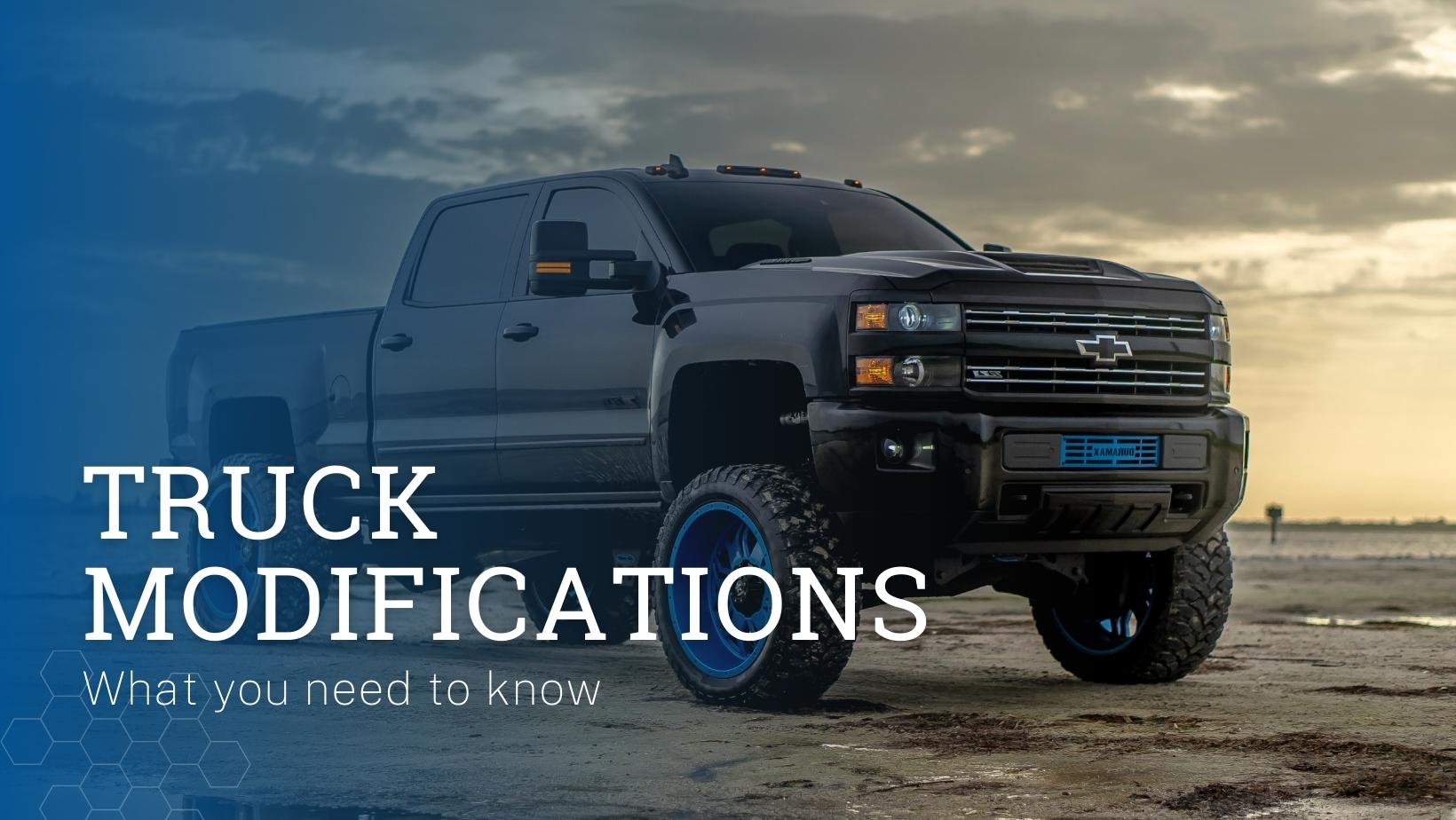 Text that reads "Truck Modifications: What you need to know" over a blue background with a photo of a black ford pickup truck.
