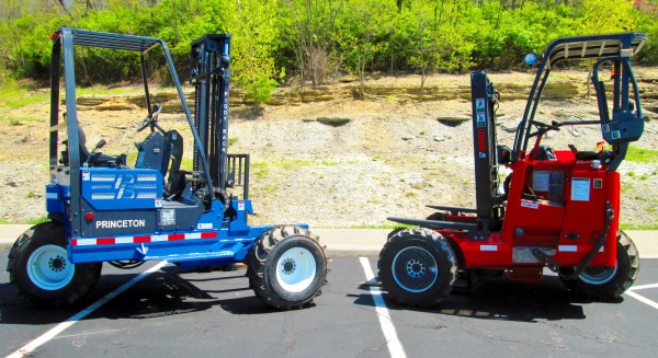 blue and red forklifts facing each other