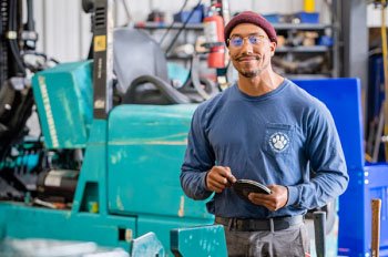 a working smiling while working